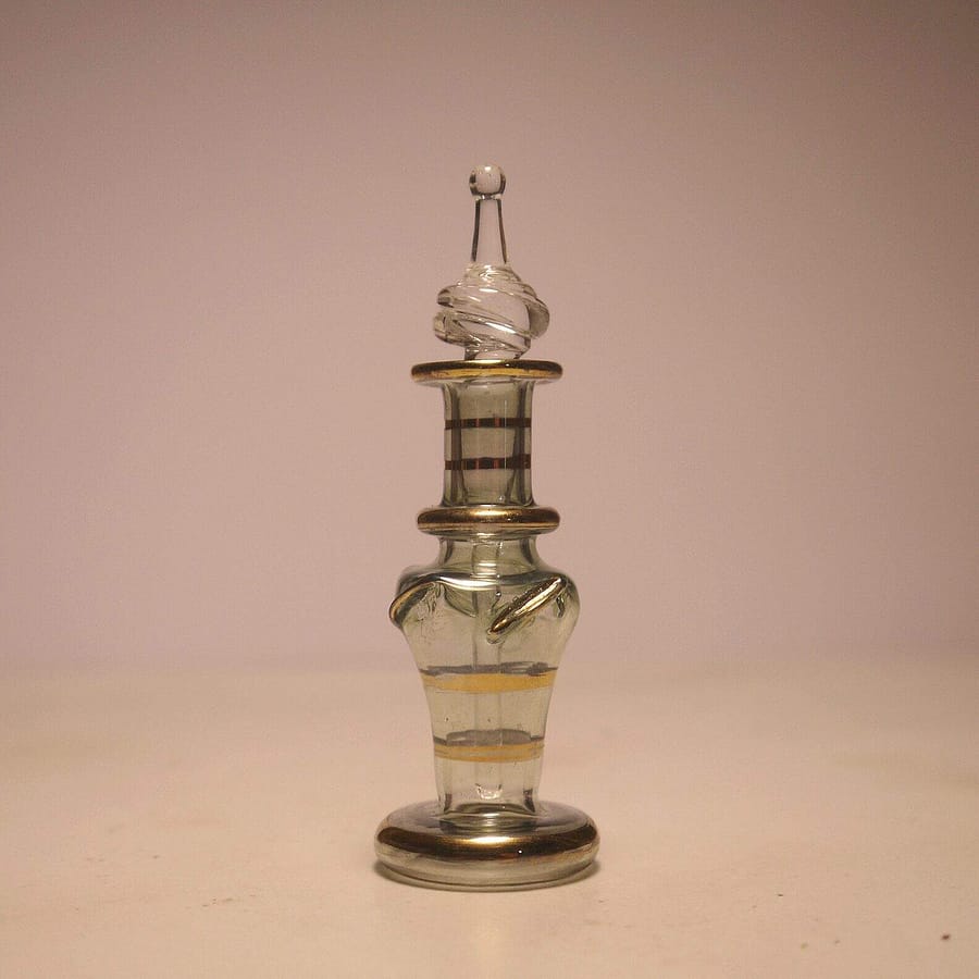 Emerald Urn hand-blown glass perfume bottle in rich emerald color